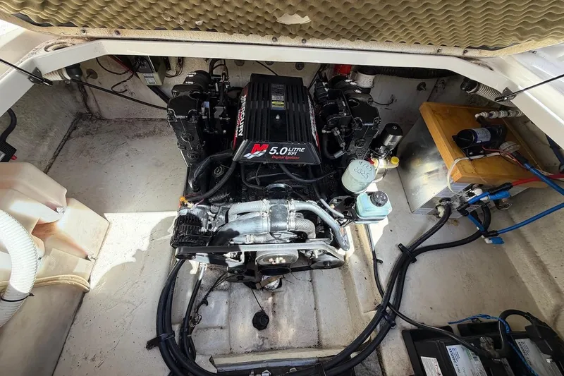 Slide: The Image of Engine compartment of a 2002 Sea Ray 240 Sundancer with MerCruiser 5.0L engine. - 33