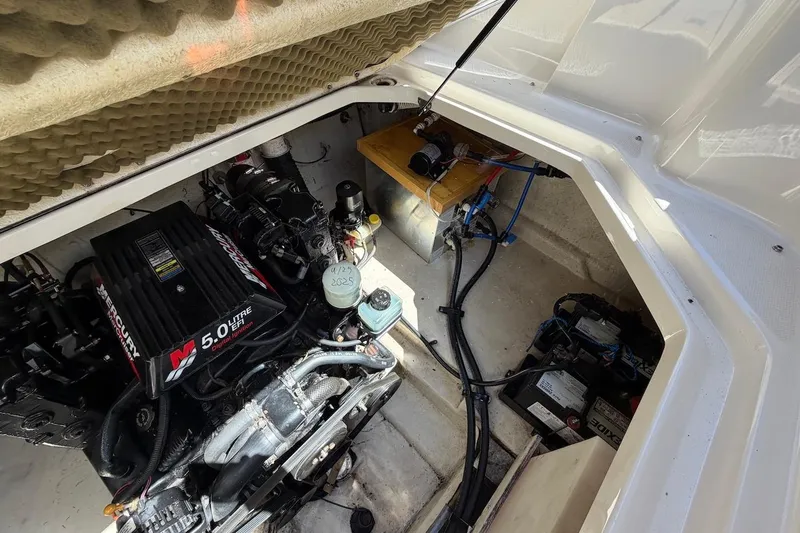 Slide: The Image of Engine compartment of a 2002 Sea Ray 240 Sundancer with Mercury 5.0L EFI engine. - 34