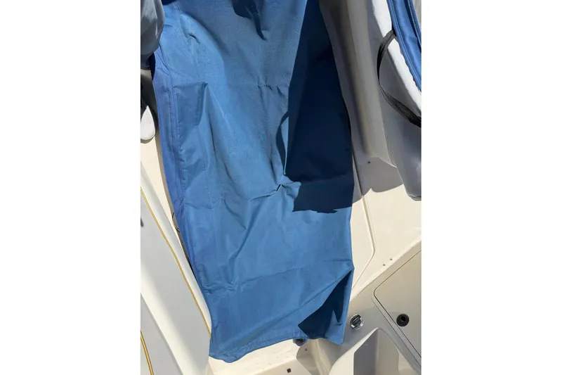 Slide: The Image of Blue cover on 2002 Sea Ray 240 Sundancer boat deck. - 40