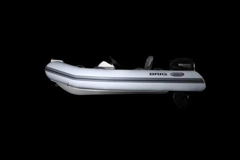 Slide: The Image of Manufacturer Provided Image: 2025 Brig Falcon 330 inflatable boat, side view, black background. - 2