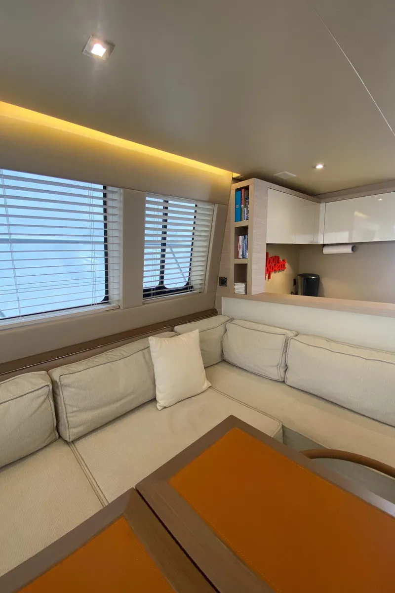 Slide: The Image of Luxurious interior of 2017 Beneteau Monte Carlo MC6 yacht with elegant seating and modern design. - 29
