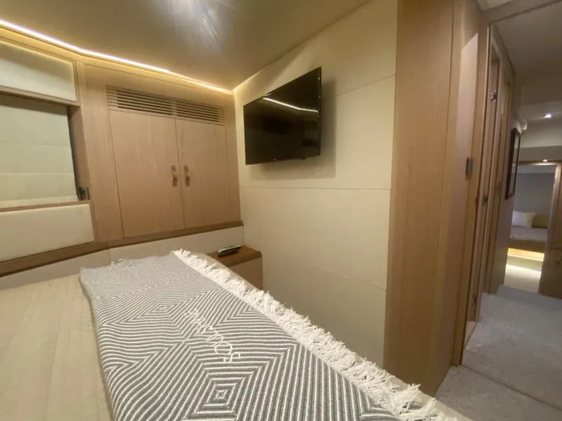Slide: The Image of 2017 Beneteau Monte Carlo MC6 cabin interior with TV and modern decor. - 36