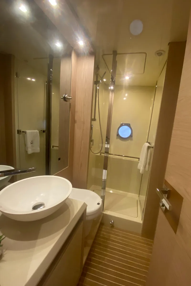 Slide: The Image of Luxurious bathroom in 2017 Beneteau Monte Carlo MC6 yacht with modern fixtures and shower. - 37
