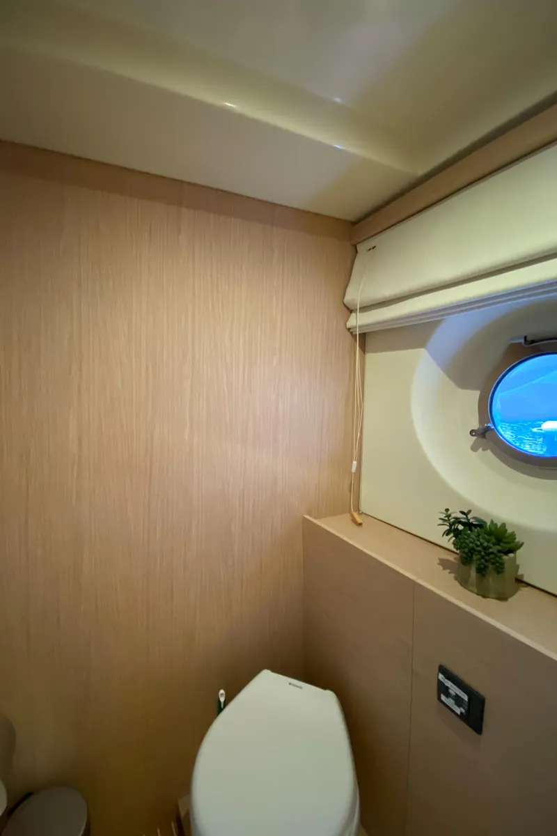 Slide: The Image of 2017 Beneteau Monte Carlo MC6 bathroom with porthole and modern design. - 45