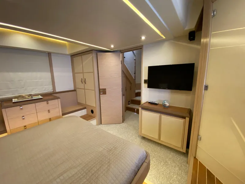 Slide: The Image of Luxurious interior of 2017 Beneteau Monte Carlo MC6 yacht bedroom with modern furnishings. - 48