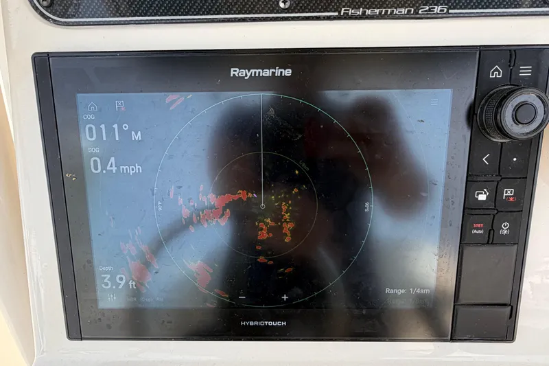 Slide: The Image of Raymarine display on 2018 Grady-White Fisherman 236 showing navigation data. - 22