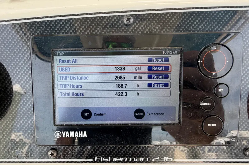 Slide: The Image of Dashboard of 2018 Grady-White Fisherman 236 showing trip data and fuel usage. - 23