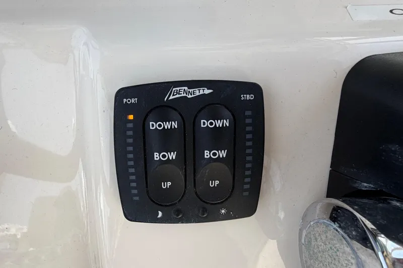 Slide: The Image of Bennett trim tab control panel on 2018 Grady-White Fisherman 236 boat. - 26