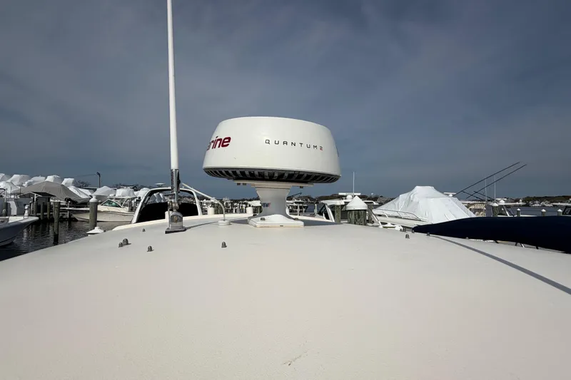 Slide: The Image of 2018 Grady-White Fisherman 236 boat with radar, docked in marina. - 28