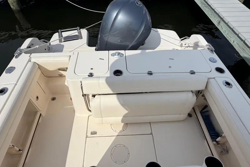 Slide: The Image of 2018 Grady-White Fisherman 236 boat interior with seating and storage compartments. - 32