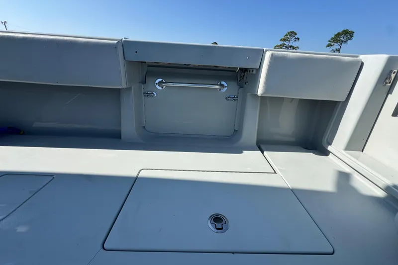 Slide: The Image of 2016 Contender 35 ST boat interior with storage compartments and sleek design. - 17
