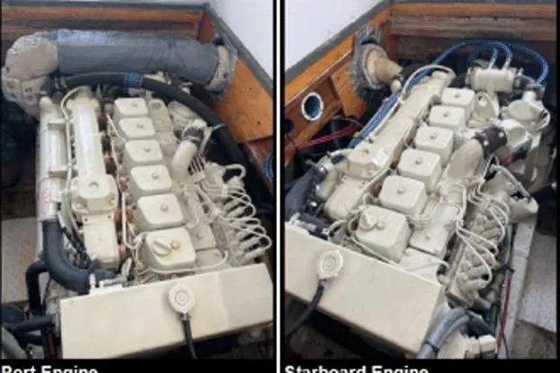 Slide: The Image of Twin engines of a 1996 KenCraft Down East Express 35 boat, port and starboard views. - 18