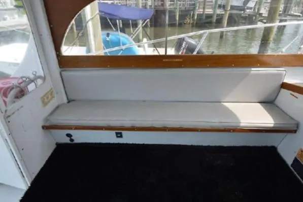 Slide: The Image of Interior seating of 1996 KenCraft Down East Express 35 boat, dockside view. - 6