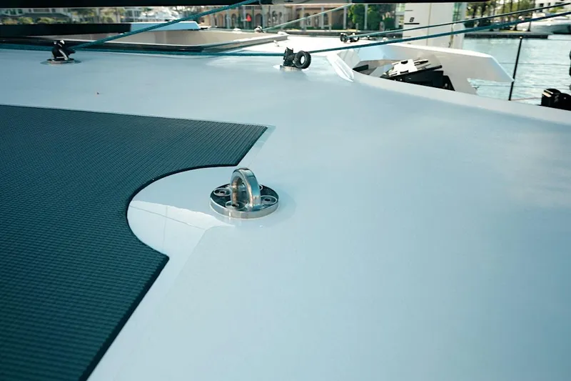 Slide: The Image of Deck detail of 2026 HH Catamarans HH60, featuring sleek design and modern fittings. - 17