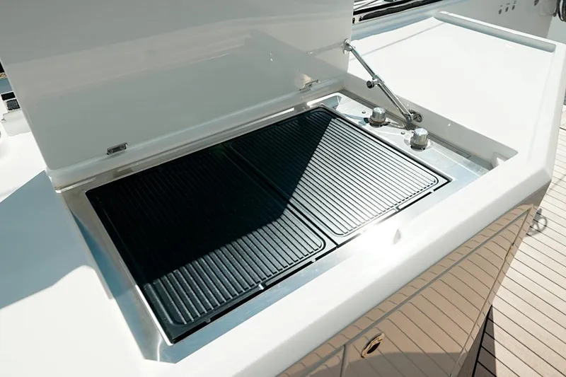 Slide: The Image of Outdoor grill on 2026 HH Catamarans HH60 yacht, featuring sleek design and modern amenities. - 22