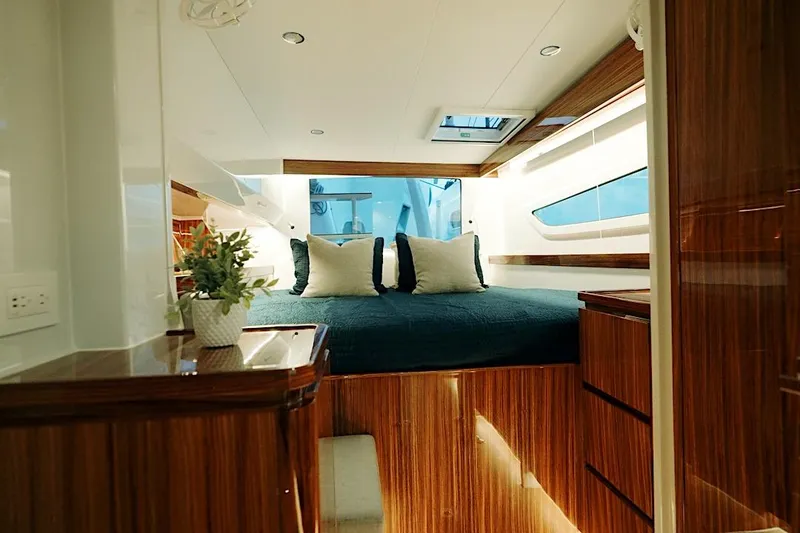 Slide: The Image of Luxurious cabin interior of 2026 HH Catamarans HH60, featuring elegant wood finishes and modern design. - 37