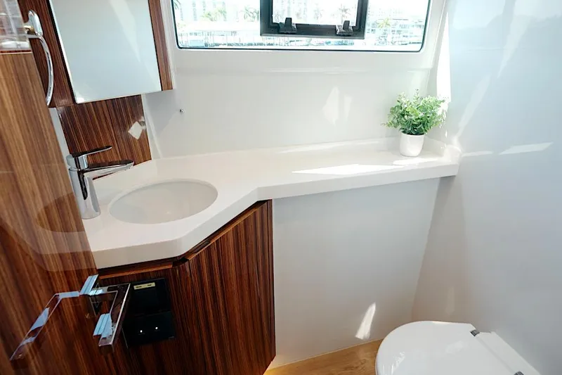 Slide: The Image of Luxurious bathroom interior of 2026 HH Catamarans HH60, featuring sleek design and modern fixtures. - 46