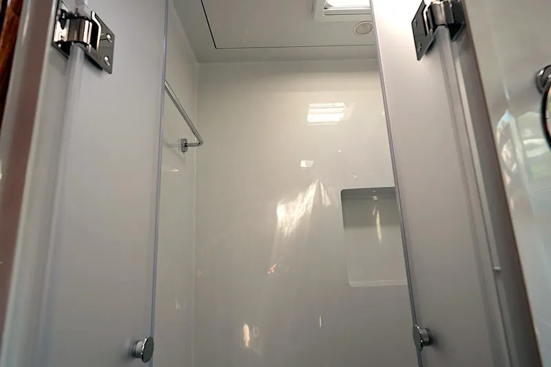 Slide: The Image of Interior of 2026 HH Catamarans HH60 shower area with sleek, modern design. - 47