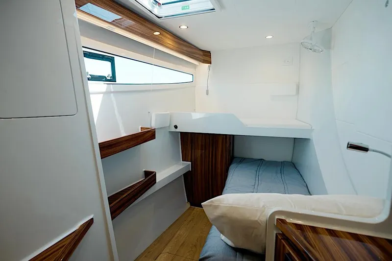Slide: The Image of Luxurious cabin interior of 2026 HH Catamarans HH60, featuring modern design and wood accents. - 49