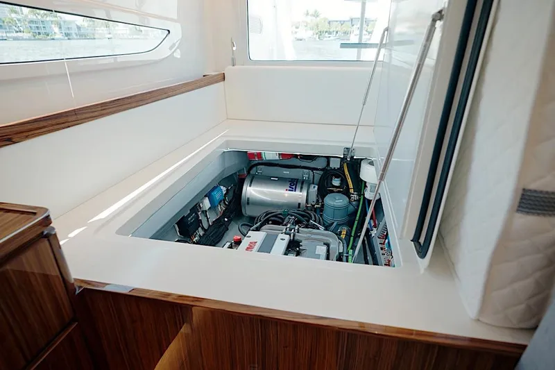 Slide: The Image of Engine compartment of 2026 HH Catamarans HH60, showcasing modern marine technology and design. - 51