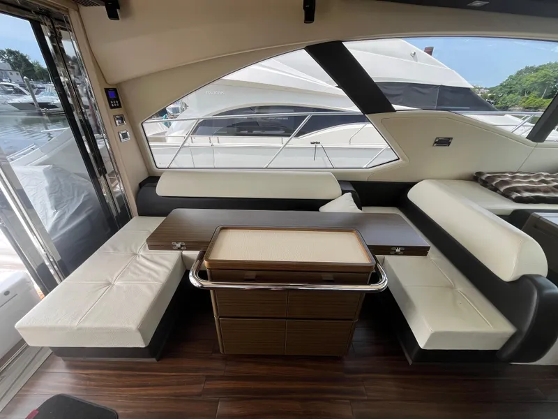 Slide: The Image of Interior of 2014 Azimut 55S yacht with elegant seating and wooden flooring. - 19