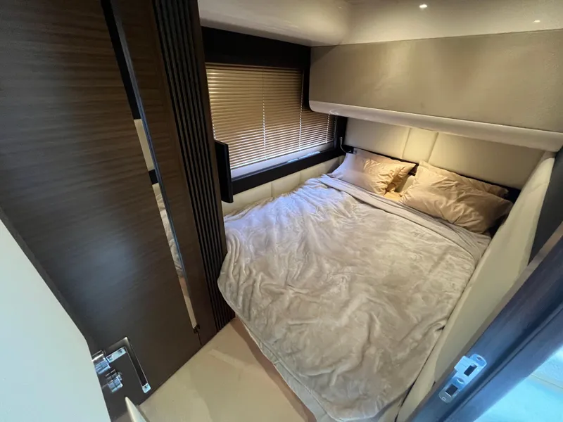 Slide: The Image of Luxurious bedroom interior of 2014 Azimut 55S yacht with cozy bedding and modern design. - 28