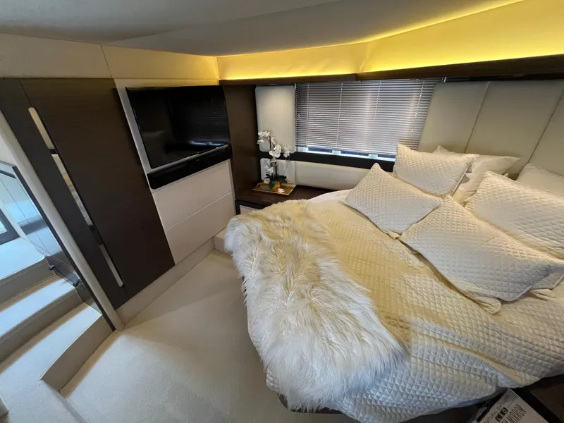 Slide: The Image of Luxurious bedroom interior of 2014 Azimut 55S yacht with plush bedding and modern decor. - 32