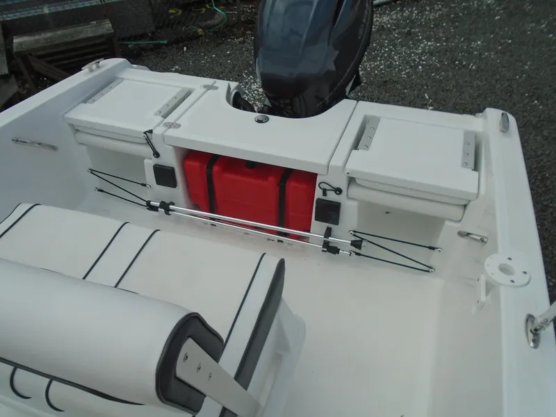 Slide: The Image of Interior view of a 2021 Wellcraft 162 Fisherman boat. - 10