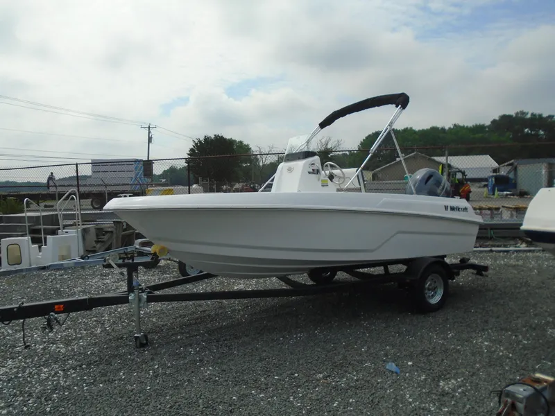 Slide: The Image of 2021 Wellcraft 162 Fisherman boat on trailer outdoors. - 5