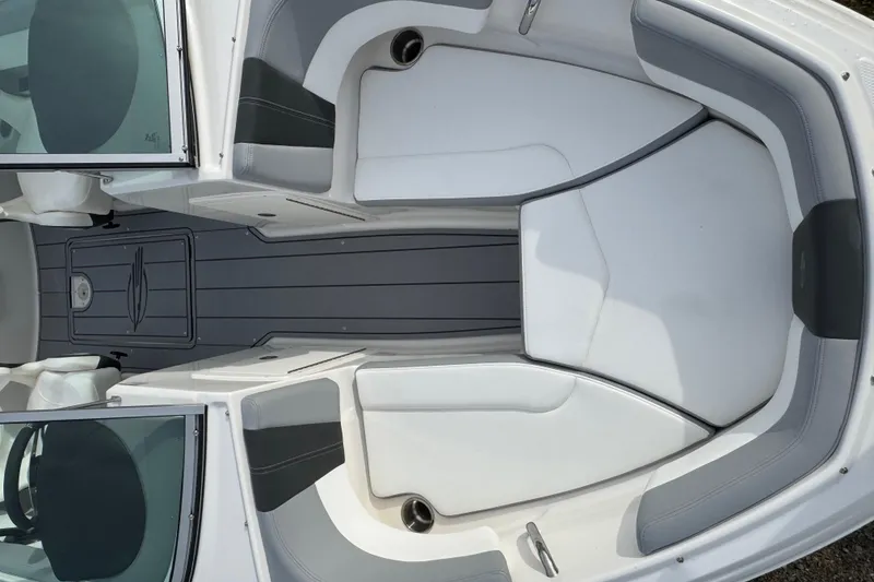 Slide: The Image of 2026 Chaparral 19 SSi OB boat interior with sleek seating and modern design. - 14