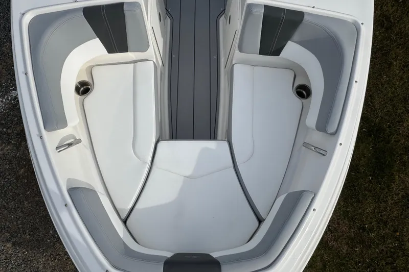 Slide: The Image of 2026 Chaparral 19 SSi OB boat interior with gray and white seating. - 15