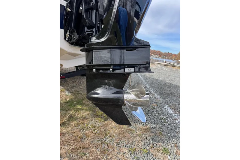 Slide: The Image of 2026 Chaparral 19 SSi OB boat propeller and outboard motor detail. - 18