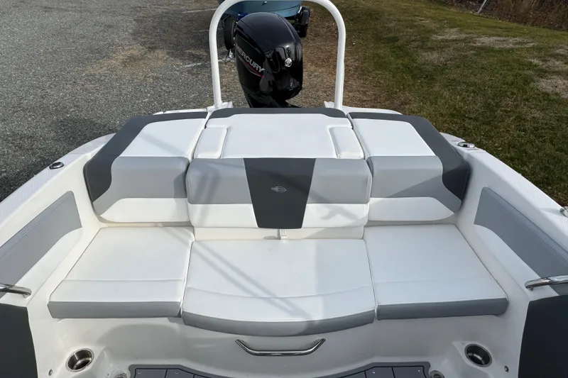 Slide: The Image of 2026 Chaparral 19 SSi OB boat with sleek seating and Mercury outboard motor. - 4