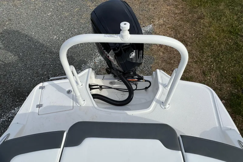 Slide: The Image of 2026 Chaparral 19 SSi OB boat with outboard motor, viewed from above. - 7