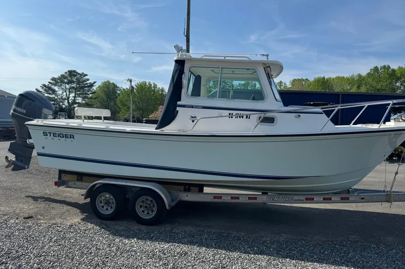The Image of 2014 Steiger Craft 23 Miami boat on trailer, side view, outdoors. - 0