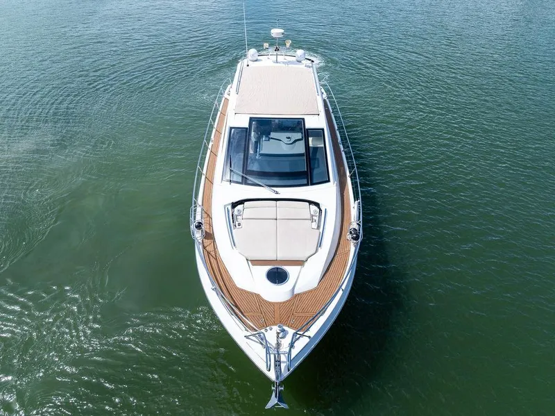 Slide: The Image of 2014 Cranchi 56 HT yacht on calm water, aerial view. - 13