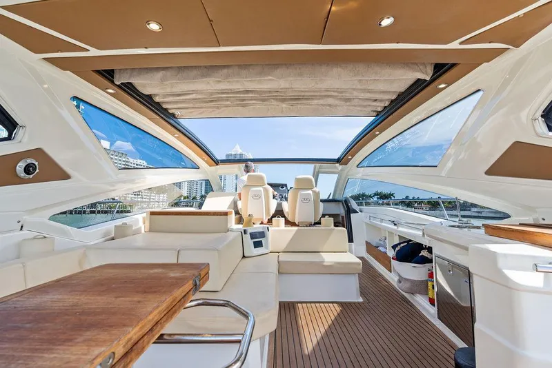 Slide: The Image of Luxurious interior of 2014 Cranchi 56 HT yacht with spacious seating and modern design. - 22