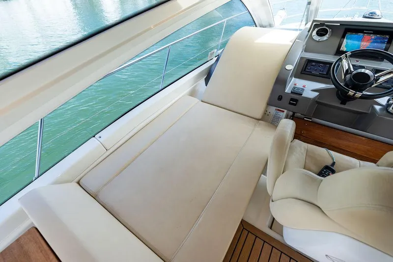 Slide: The Image of Luxurious interior of 2014 Cranchi 56 HT yacht with plush seating and modern dashboard. - 39
