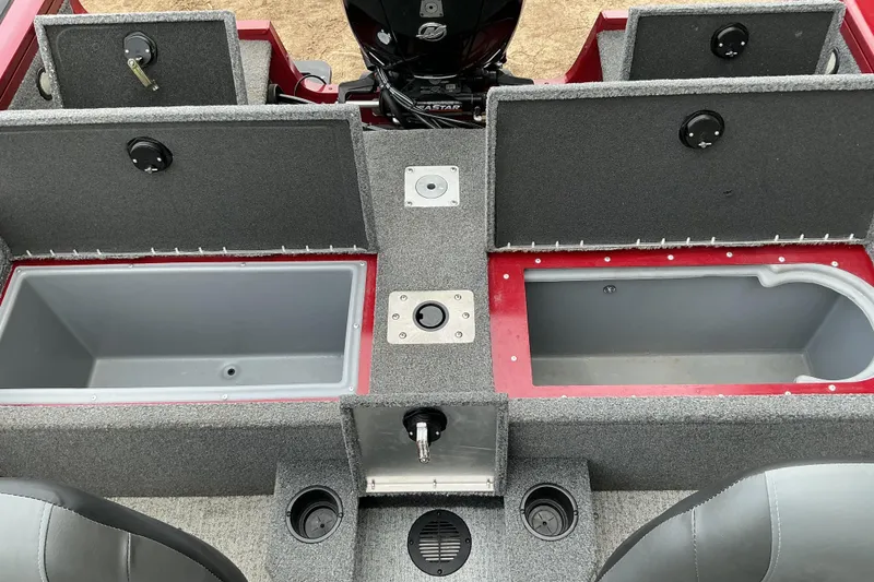 Slide: The Image of 2020 Tracker Targa V-18 WT boat interior with storage compartments and seating. - 11