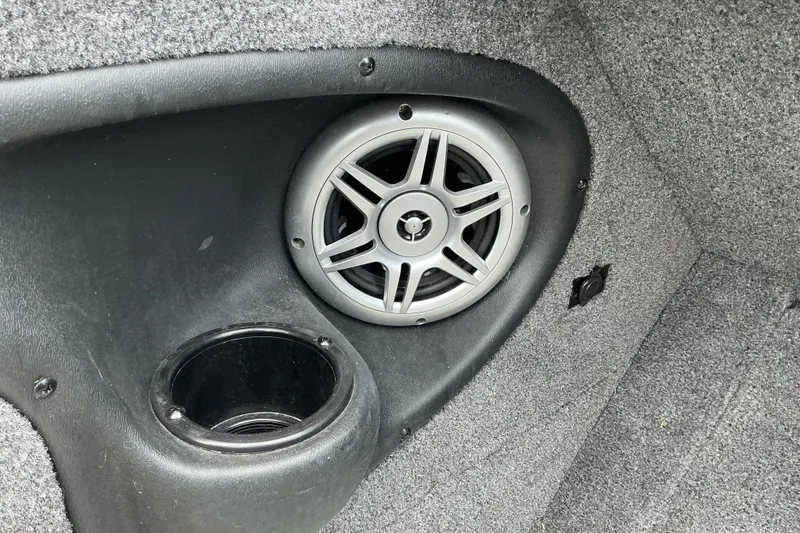 Slide: The Image of Speaker and cup holder in 2020 Tracker Targa V-18 WT boat interior. - 9