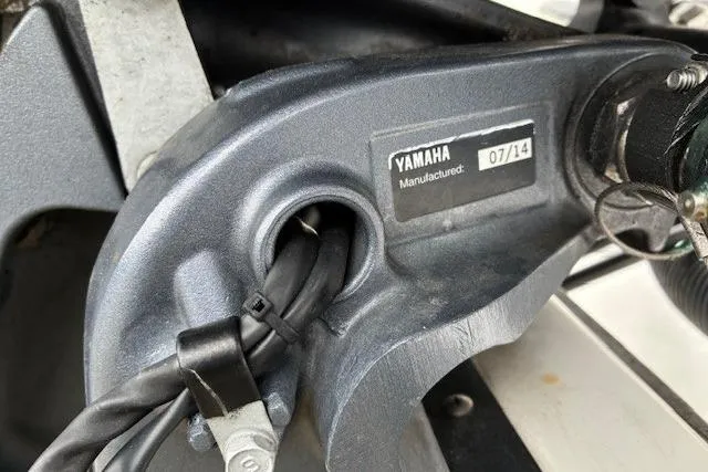 Slide: The Image of Close-up of Yamaha engine part on 2015 Edgewater 245CC boat, manufactured in July 2014. - 4