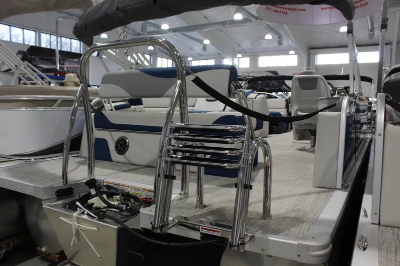 Slide: The Image of 2026 Avalon 2185 25 LSZ CRB pontoon boat interior with seating and ladder. - 8