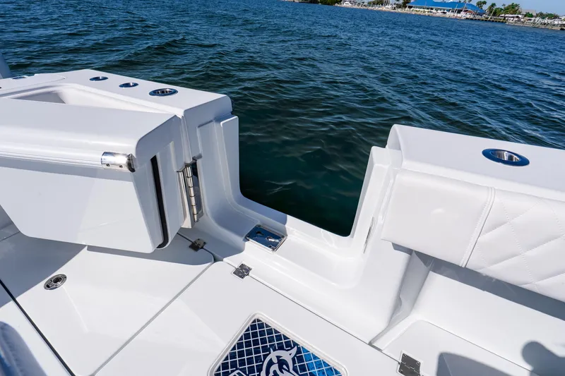 Slide: The Image of Freeman 35 boat, 2026 model, featuring sleek white seating and ocean view. - 48