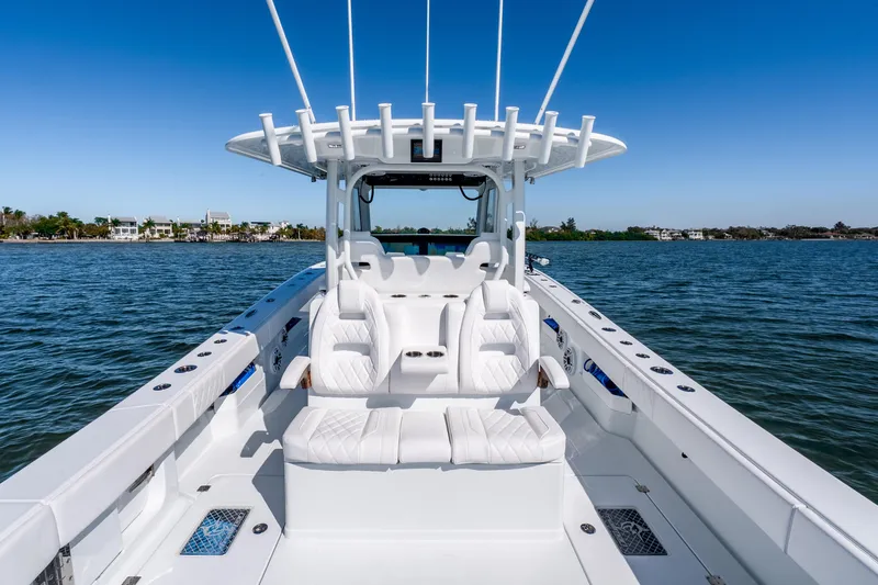 Slide: The Image of Modern Freeman 35 boat interior, 2026 model, featuring sleek white seating and open water view. - 51