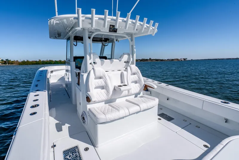 Slide: The Image of 2026 Freeman 35 boat with sleek white seating on open water. - 53