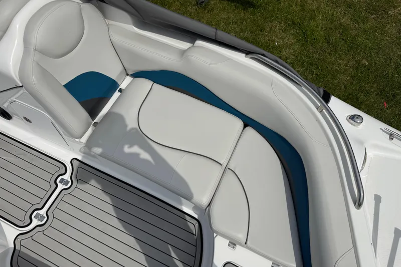 Slide: The Image of 2019 Hurricane SunDeck Sport 202 IO boat interior with cushioned seating and sleek design. - 12