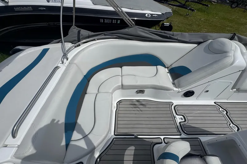 Slide: The Image of 2019 Hurricane SunDeck Sport 202 IO boat interior with cushioned seating and sleek design. - 25