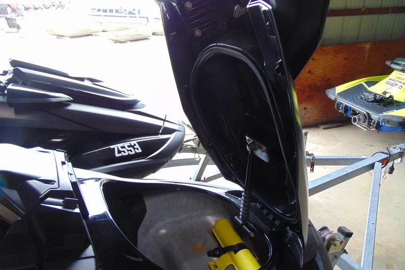 Slide: The Image of 2021 Yamaha WaveRunner FX Cruiser SVHO with open storage compartment on trailer. - 5