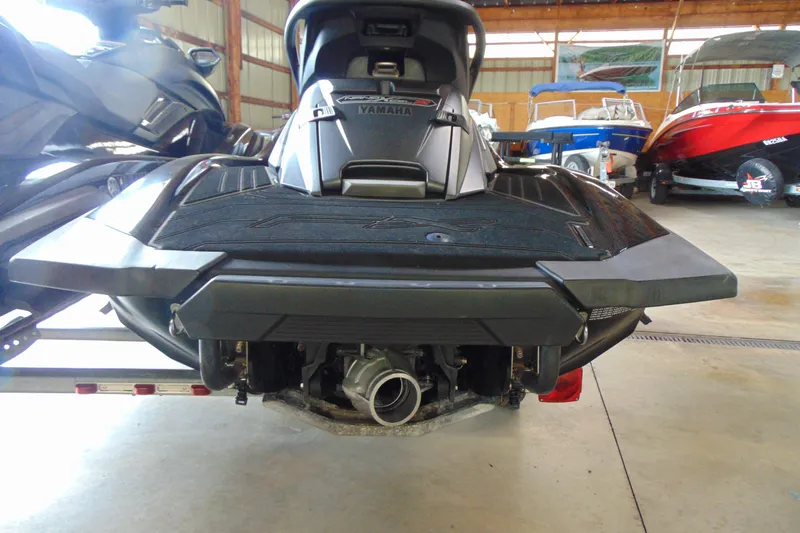 Slide: The Image of 2021 Yamaha WaveRunner FX Cruiser SVHO in a storage facility, rear view. - 9