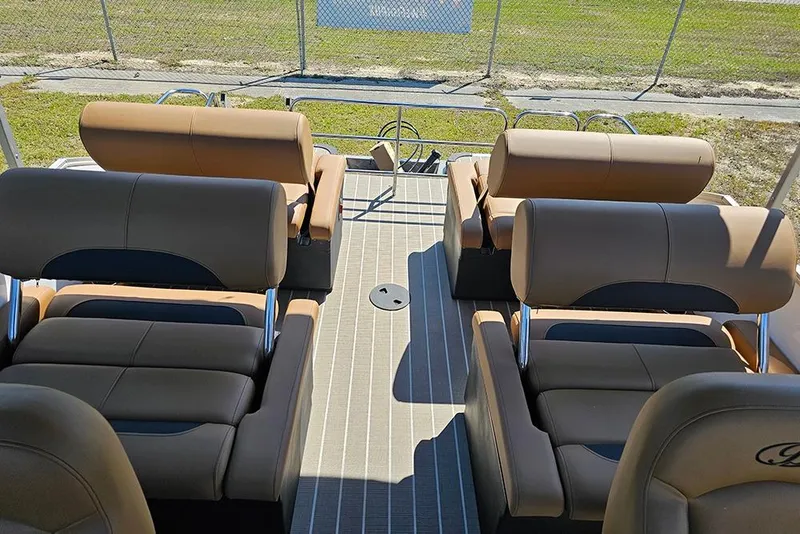 Slide: The Image of 2026 Bentley Pontoons Legacy 223 QSB interior with luxurious seating arrangement. - 14